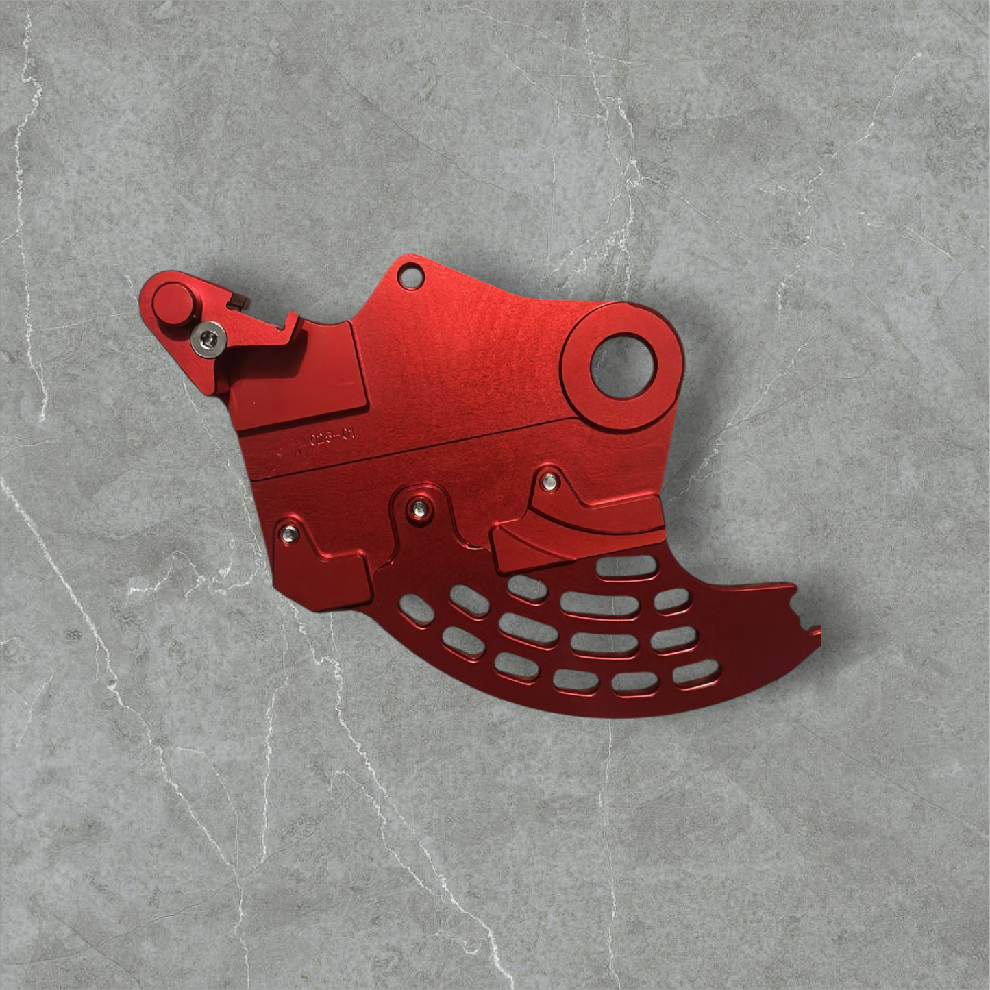 Hard enduro rear brake disk guard.