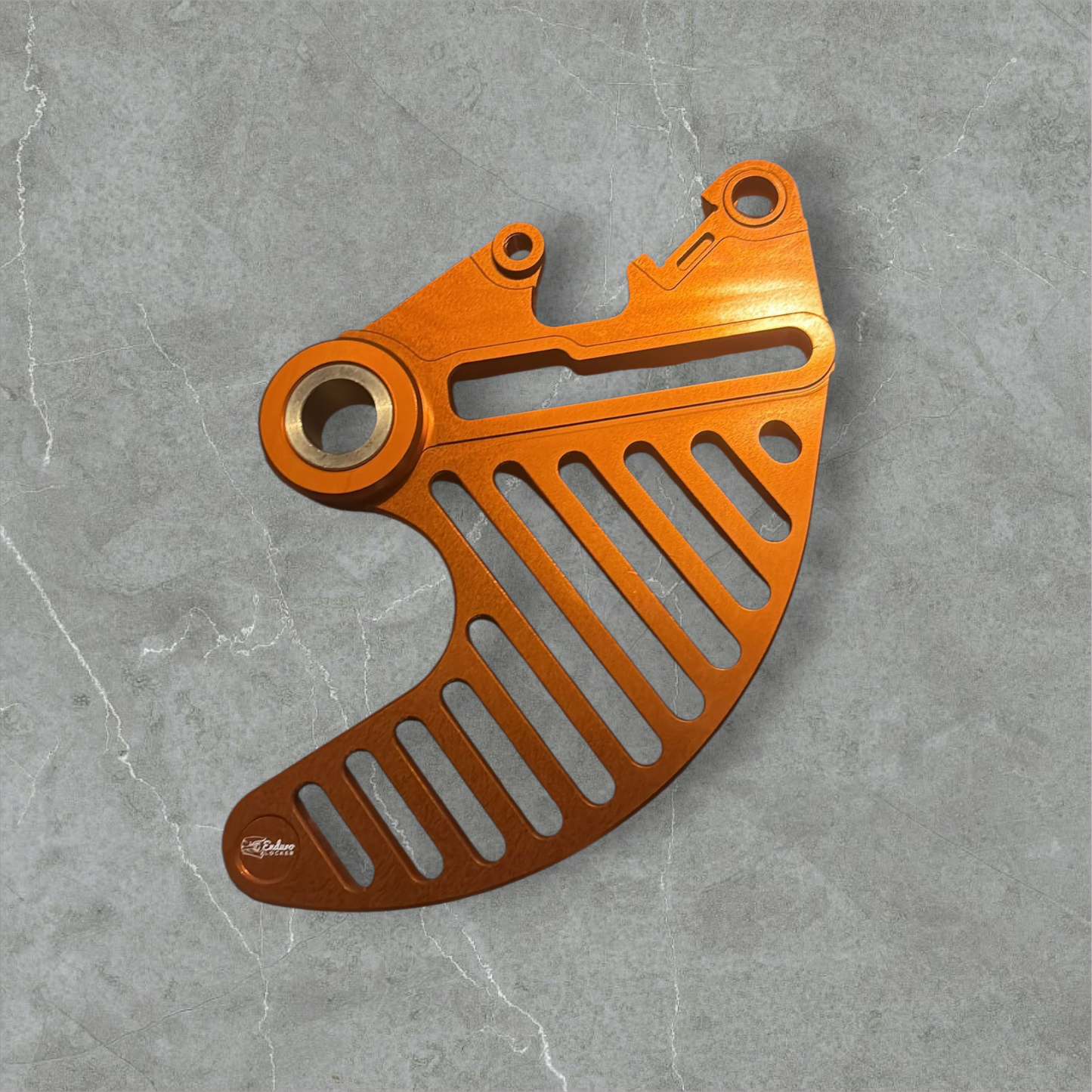 Hard enduro rear brake disk guard.